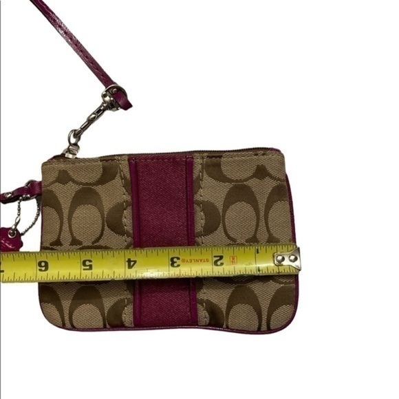 Coach khaki brown signature c and purple fuchsia wristlet
